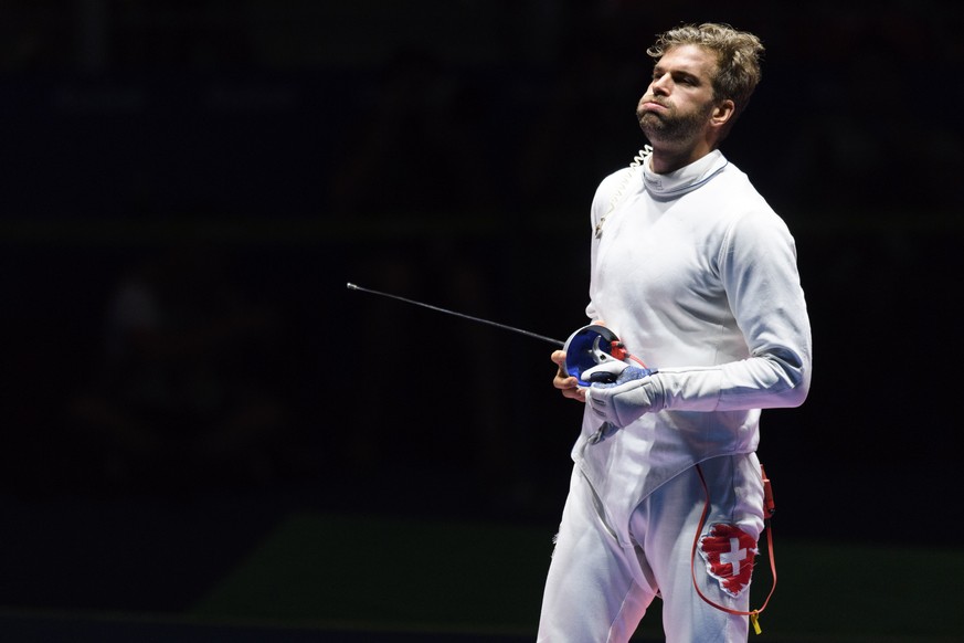 Switzerland&#039;s Benjamin Steffen reacts after losing against Gauthier Grumier of France in the men&#039;s epee individual bronze medal game in the Carioca Arena 3 in Rio de Janeiro, Brazil, at the  ...