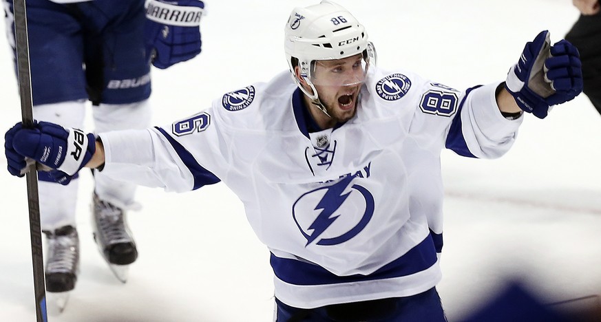 Tampa Bay Lightning right wing Nikita Kucherov (86) celebrates a goal by Ondrej Palat against the Detroit Red Wings in the third period of Game 4 of a first-round NHL Stanley Cup hockey playoff series ...