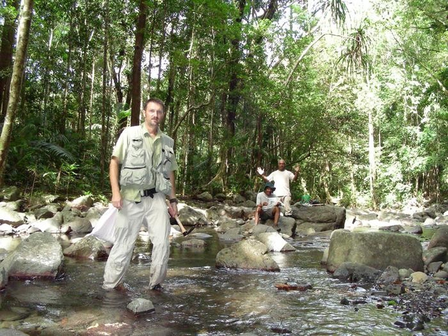 Professor Chris Austin with colleagues Jim Anamiato (standing) and Ilaiah Bigilale from the Papua New Guinea National Museum and Art Gallery, Sandaun Province Papua New Guinea in 2006.