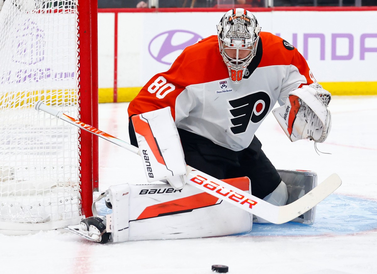 Philadelphia Flyers goaltender Dan Vladar makes a save during the second period of an NHL hockey game against the New Jersey Devils, Saturday, Nov. 29, 2025, in Newark, N.J. (AP Photo/Noah K. Murray)
 ...