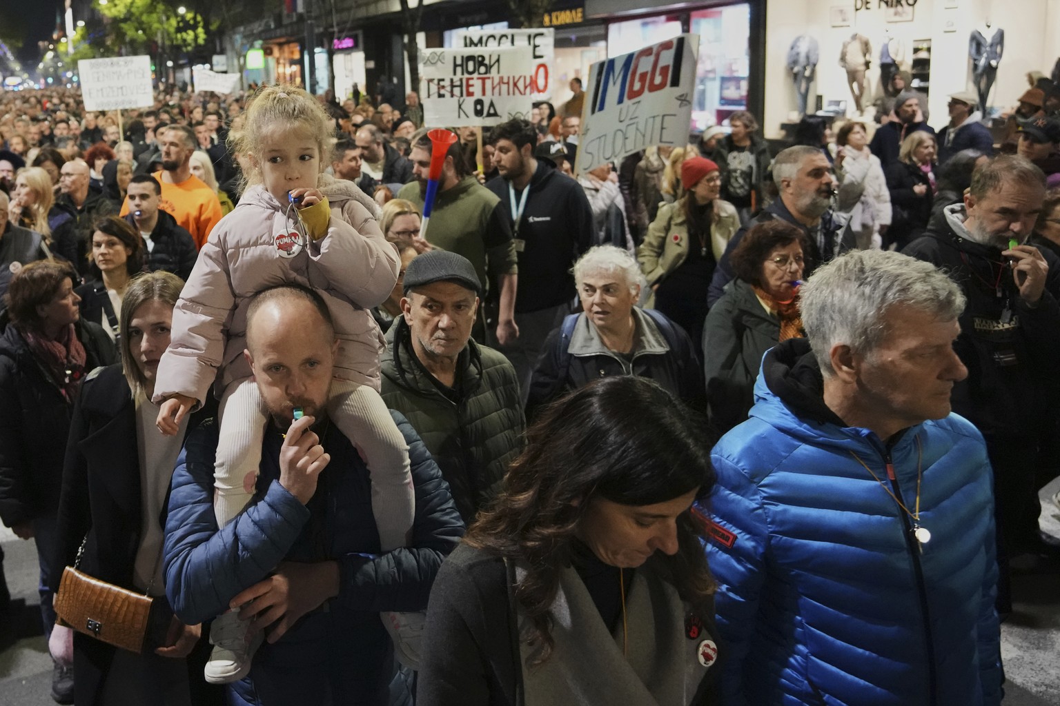 People protest government pressure and hate speech targeting university students and their professors who have been behind months of anti-corruption demonstrations in Belgrade, Serbia, Monday, March 3 ...