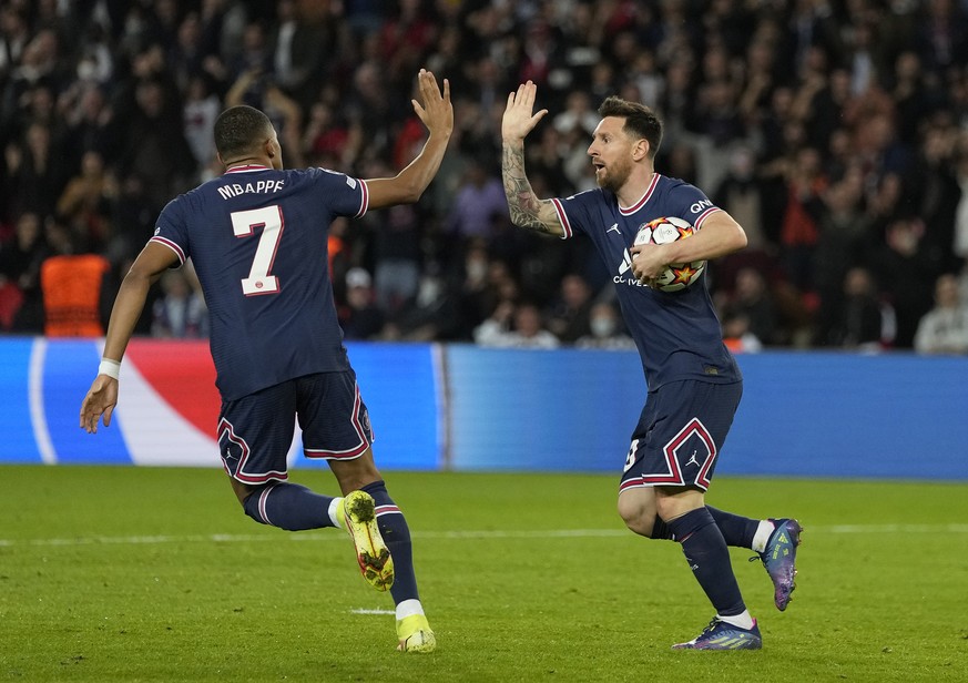 PSG&#039;s Lionel Messi, right, celebrates with PSG&#039;s Kylian Mbappe after scoring his side&#039;s second goal during the Champions League group A soccer match between Paris Saint Germain and RB L ...