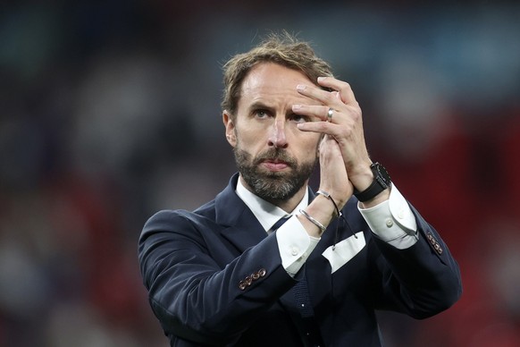 England&#039;s manager Gareth Southgate applauds the fans after Italy won the Euro 2020 soccer championship final match between England and Italy at Wembley stadium in London, Sunday, July 11, 2021. I ...