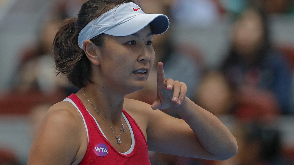 Chinese tennis player Peng Shuai reacts during her women's singles match at the China Open tennis tournament in Beijing on Oct. 5, 2016. When Peng disappeared from public view this month after ac ...