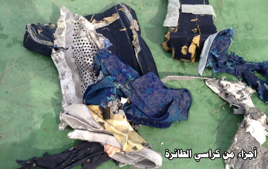 epa05676798 (FILE) A file handout picture dated 21 May 2016 made available by the Egyptian Defence Ministry showing pieces of a chair from the EgyptAir MS804 flight missing at sea, unspecified locatio ...