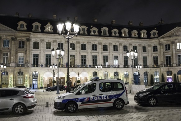epa06429745 A police car is parked in front of the main entrance of the Ritz where a burglary took place on January 10, 2018 in Paris, France.  According to the latest reports, several million worth of jewelry ...