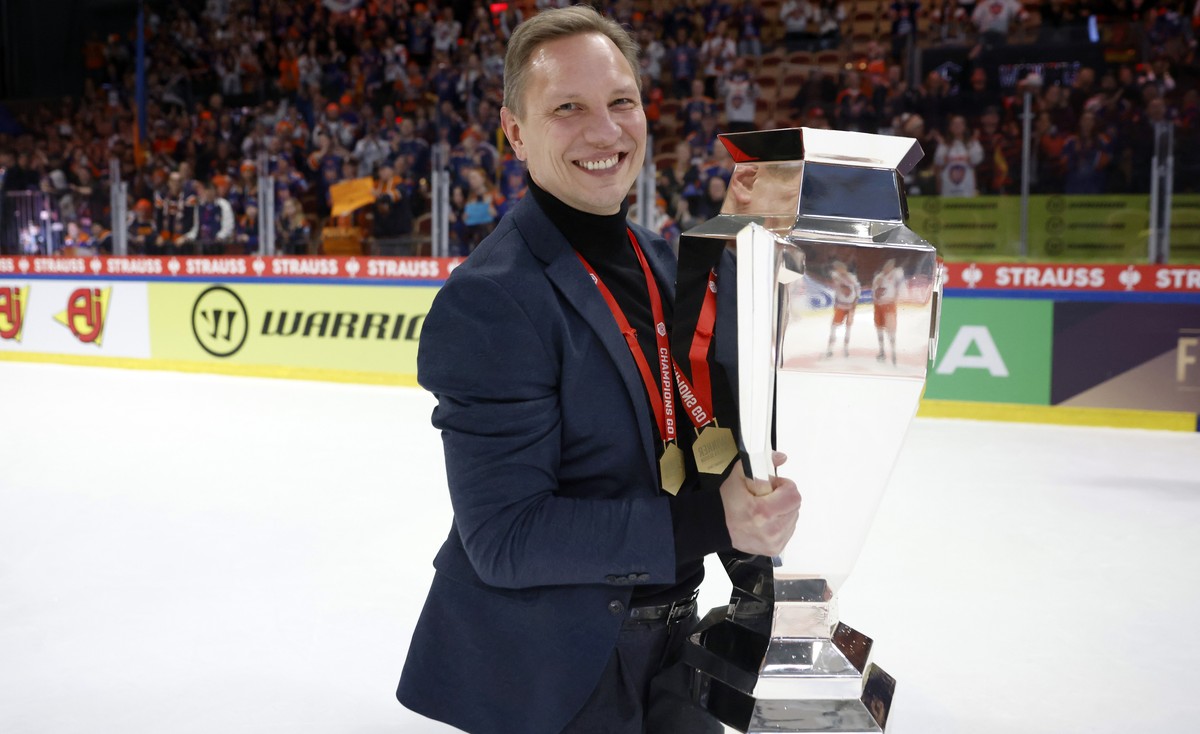 Tappara's head coach Jussi Tapola poses with the trophy after winning the Champions Hockey League final ice hockey match between Lulea Hockey and Tappara Tampere at Coop Norrbotten Arena in Lulea ...
