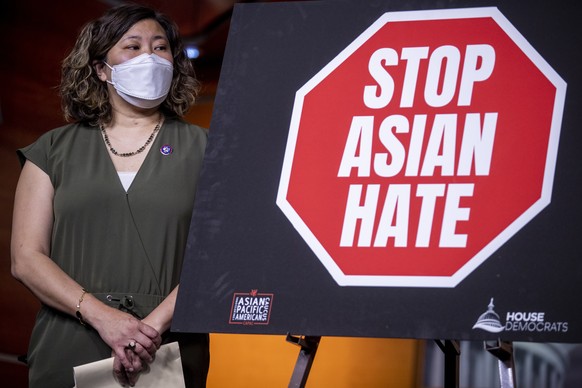 epa09208958 Democratic Representative from New York Grace Meng listens to remarks during a press conference about the COVID-19 Hate Crimes Act in the US Capitol in Washington, DC, USA, 18 May 2021. Th ...