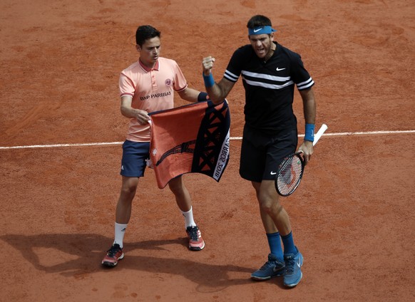 epa06790602 Juan Martin Del Potro of Argentina reacts as he plays Marin Cilic of Croatia during their menâs quarter final match during the French Open tennis tournament at Roland Garros in Paris, Fr ...