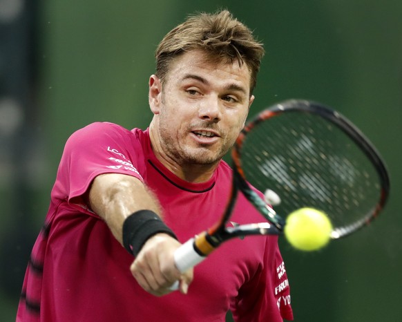 epa05851166 Stan Wawrinka of Switzerland in action against Yoshihito Nishioka of Japan during their match at the 2017 BNP Paribas Open tennis tournament at the Indian Wells Tennis Garden in Indian Wel ...