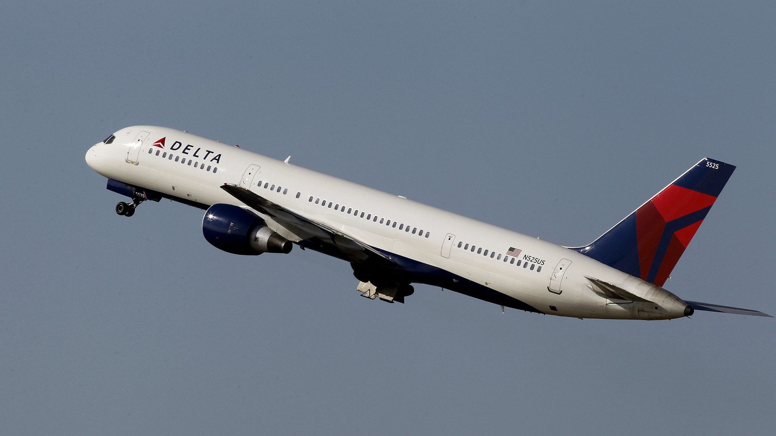 File-This photo taken Jan. 20, 2011, shows a Delta Airlines Boeing 757 taking off in Tampa, Fla. Delta Air Lines is making fundamental changes to its frequent flier program and will reward those who b ...