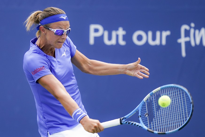 Kirsten Flipkens, of Belgium, returns to Katerina Siniakova, of the Czech Republic, at the Western &amp; Southern Open tennis tournament, Sunday, Aug. 23, 2020, in New York. (AP Photo/Frank Franklin I ...