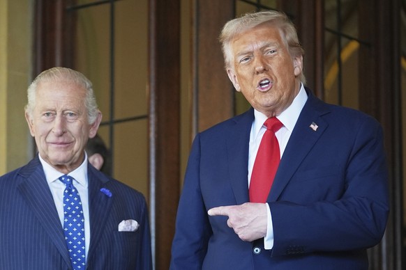 President Donald Trump gestures next to Britain&#039;s King Charles III before leaving Windsor Castle, Windsor, England, Thursday, Sept. 18, 2025. (AP Photo/Evan Vucci)
Trump Britain