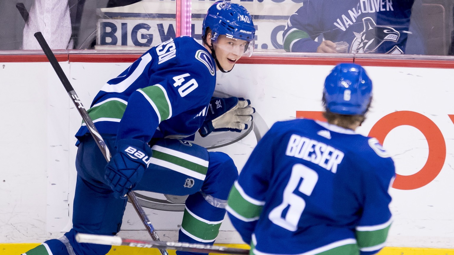 Vancouver Canucks center Elias Pettersson (40) celebrates his goal with right wing Brock Boeser (6) against the Minnesota Wild during the third period of an NHL hockey game, Monday, Oct. 29, 2018, in  ...