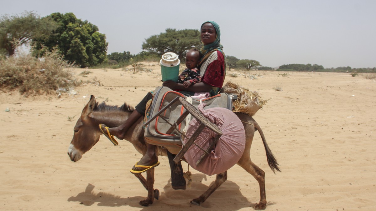 In this photo provided by UNICEF, refugees fleeing from the conflict in Sudan arrive in the village of Koufroun, near the Chad-Sudan border, in Chad Thursday, April 27, 2023. Heavy explosions and gunf ...