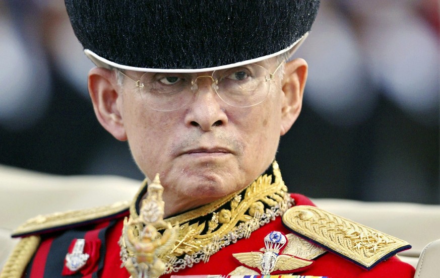 epa05583519 (FILE) A file picture dated 02 December 2004 shows Thai King Bhumibol Adulyadej inspecting the royal parade of honour in Bangkok, Thailand. A Royal palace statement, issued in Bangkok, sta ...