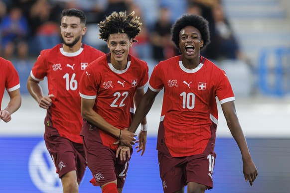 Switzerland&#039;s Franck Surdez, center, celebrates his goal with Switzerland&#039;s Leon Avdullahu, left, and Switzerland&#039;s Alvyn Sanches, right, during the Under 21 UEFA Euro 2025 Qualifying G ...