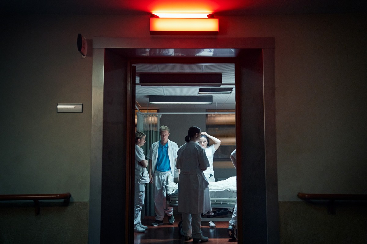The Nurse. (L to R) Fanny Louise Bernth as Pernille Kurzmann,Peter Zandersen as Niels Lunden and Josephine Park as Christina Aistrup Hansen in The Nurse. Cr. Courtesy of Netflix © 2022