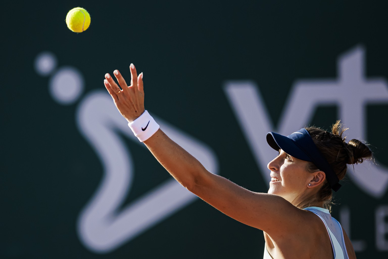 Belinda Bencic from Switzerland serves to Petra Martic from Croatia during their quarter final match at the WTA International Ladies Open Lausanne tennis tournament, in Lausanne, Switzerland, Friday,  ...