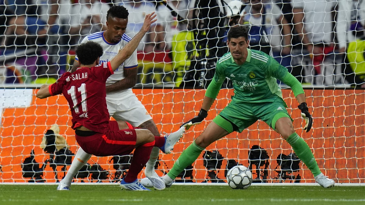 Liverpool's Mohamed Salah, left, fails to score during the Champions League final soccer match between Liverpool and Real Madrid at the Stade de France in Saint Denis near Paris, Saturday, May 28 ...