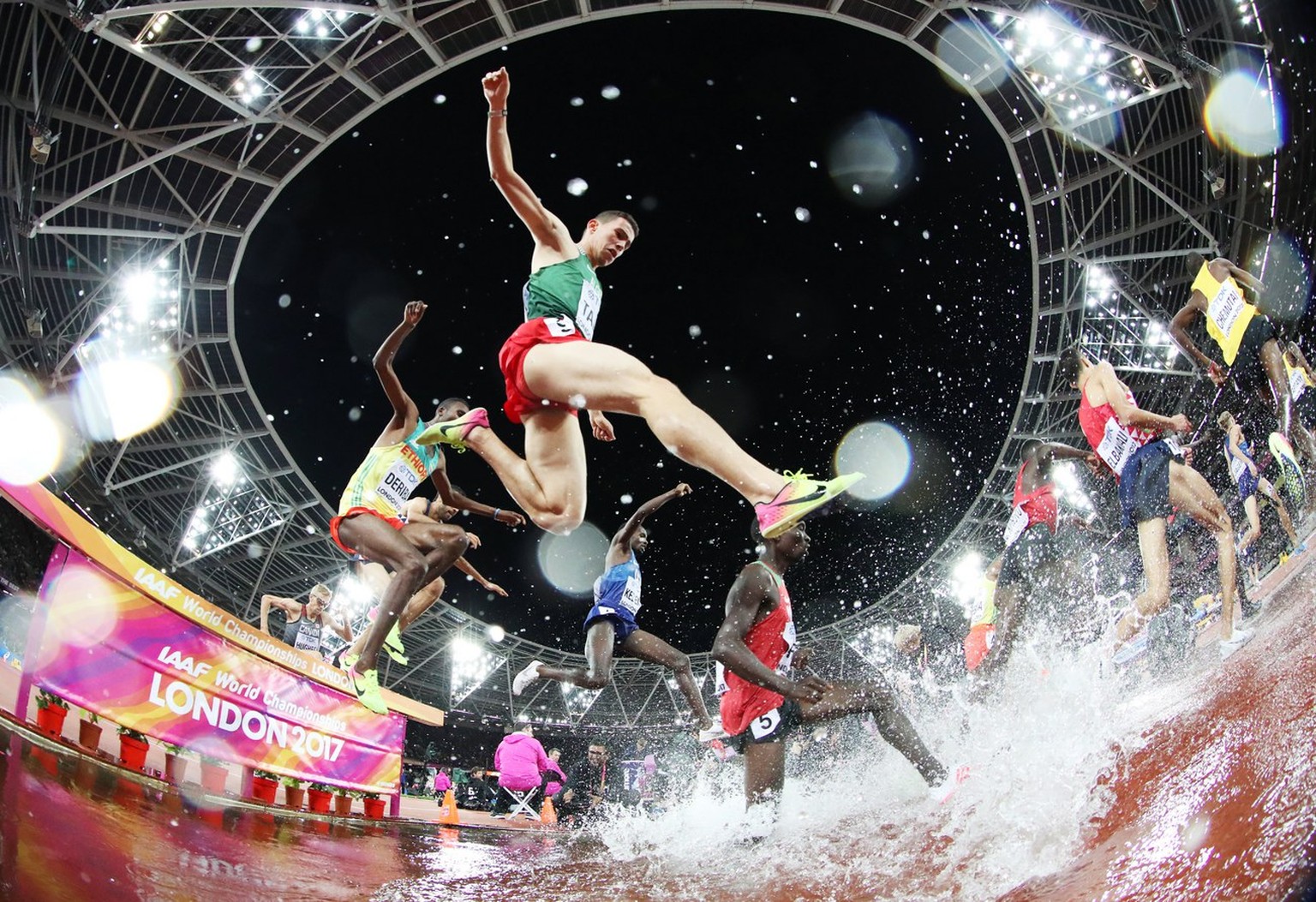 epa06260436 YEARENDER 2017 AUGUST....Athletes cross the water jump in the men&#039;s 3000m Steeplechase final at the London 2017 IAAF World Championships, in London, Britain, 08 August 2017. EPA/DIEGO ...