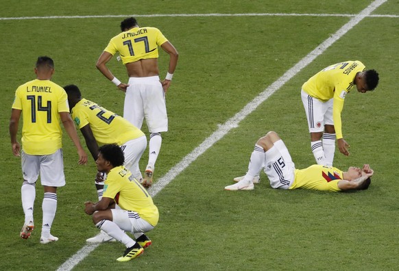 epa06862574 Players of Colombia react after the penalty shootout of the FIFA World Cup 2018 round of 16 soccer match between Colombia and England in Moscow, Russia, 03 July 2018. Colombia lost on pana ...