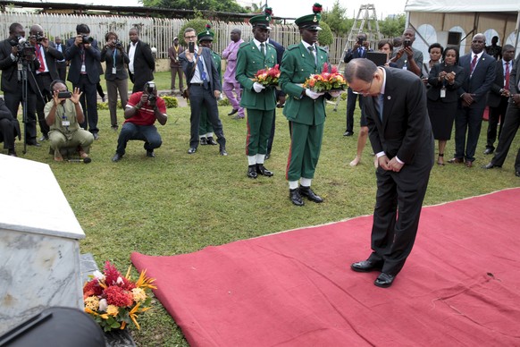 U.N. Secretary General Ban Ki-moon bows after laying a wreath in memory of persons who died in the 2011 bombing of the Abuja United Nations building by Boko Haram members, ahead of the incident&#039;s ...