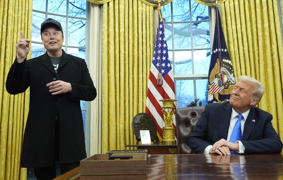 President Donald Trump listens as Elon Musk speaks in the Oval Office at the White House, Tuesday, Feb. 11, 2025, in Washington. (Photo/Alex Brandon)
Donald Trump