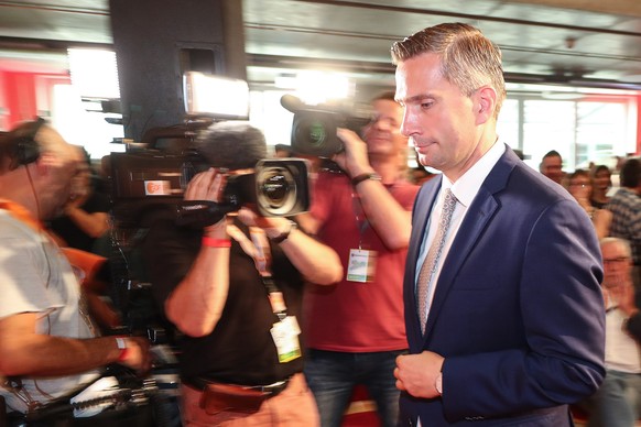 epa07810788 Martin Dulig, Saxony chairman and top candidate of the Social Democratic Party (SPD), reacts to the publication of exit polls during the Saxony state elections in Dresden, Germany, 01 Sept ...