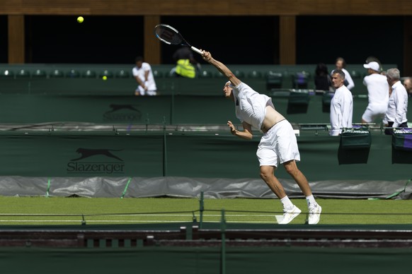 Switzerland&#039;s Marc-Andrea Huesler in action during a training session at the All England Lawn Tennis Championships in Wimbledon, London, Saturday, June 25, 2022. The Wimbledon Tennis Championship ...