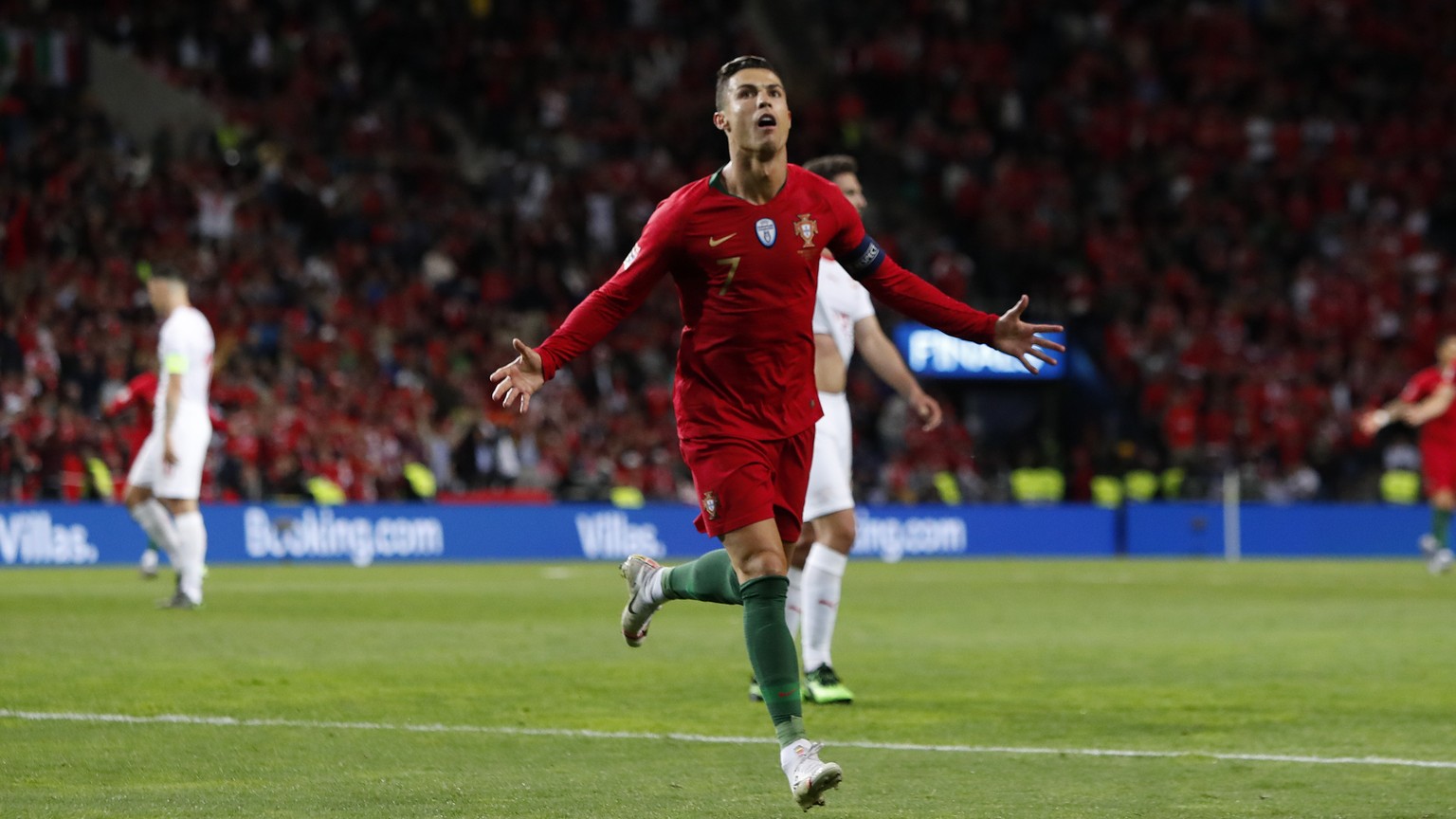 Portugal&#039;s Cristiano Ronaldo celebrates after scoring his side&#039;s third goal during the UEFA Nations League semifinal soccer match between Portugal and Switzerland at the Dragao stadium in Po ...