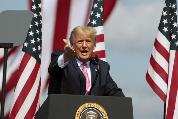 President Donald Trump speaks during a campaign rally at the Robeson County Fairgrounds in Lumberton, N.C., Saturday, Oct. 24, 2020. (AP Photo/Chris Seward)