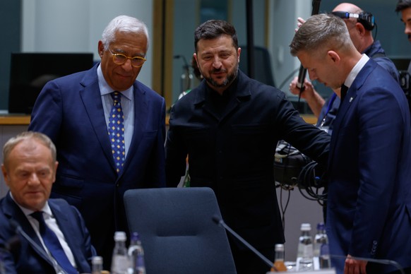 Ukraine's President Volodymyr Zelenskyy, second right, greets Hungary's Prime Minister Peter Magyar, right, next to European Council President Antonio Costa during a round table meeting at t ...