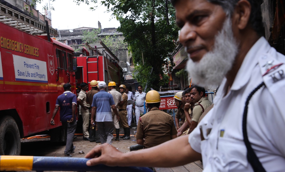 epa12064099 Indian firefighters work to extinguish a fire that broke out at a Rituraj Hotel in central Kolkata, India, 30 April 2025. At least 14 people were killed and several people were rescued in  ...
