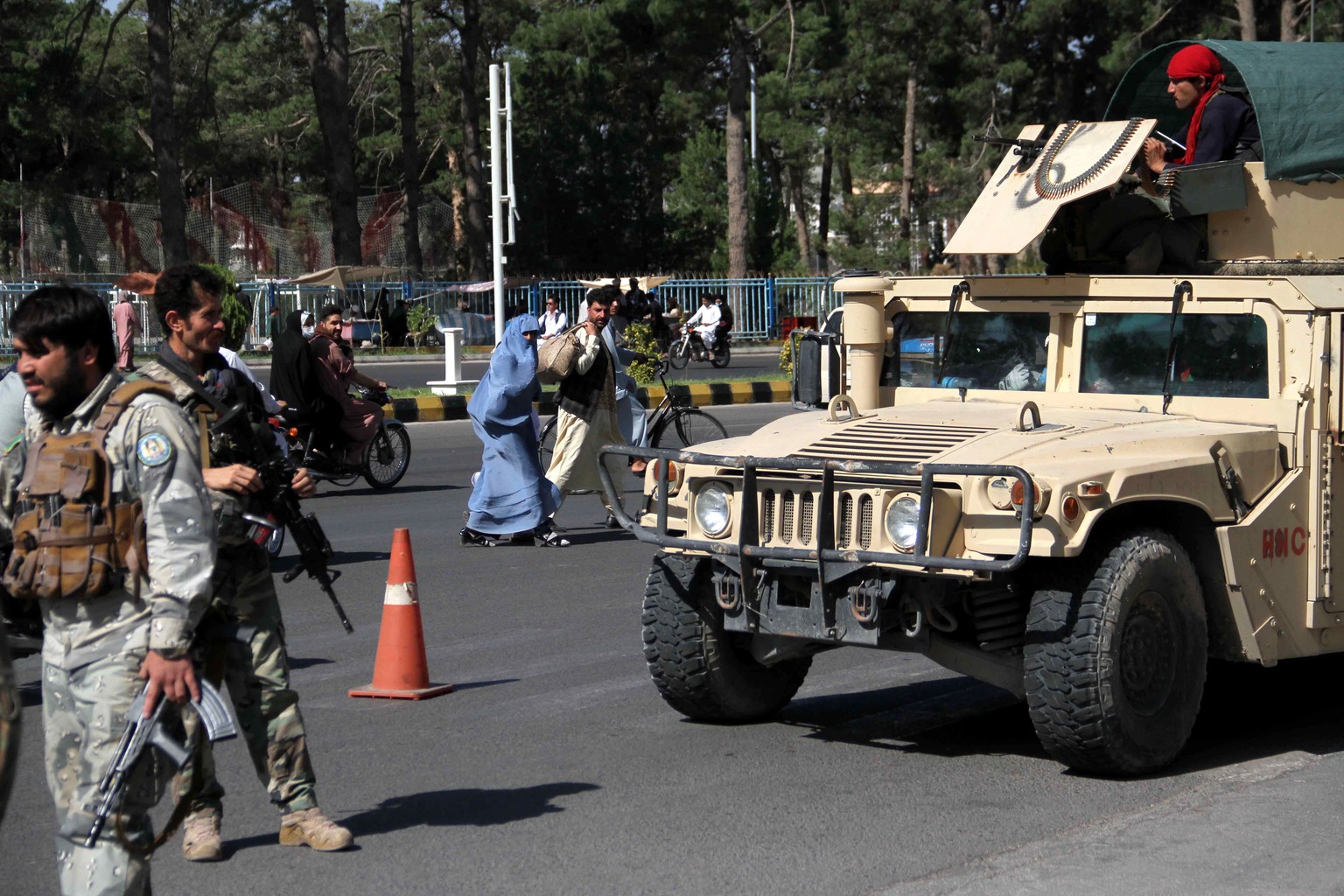 epa09403519 Afghan security officials patrol after they took back control of parts of Herat city following intense battle with Taliban militants, in Herat, Afghanistan, 07 August 2021. Heavy fighting  ...