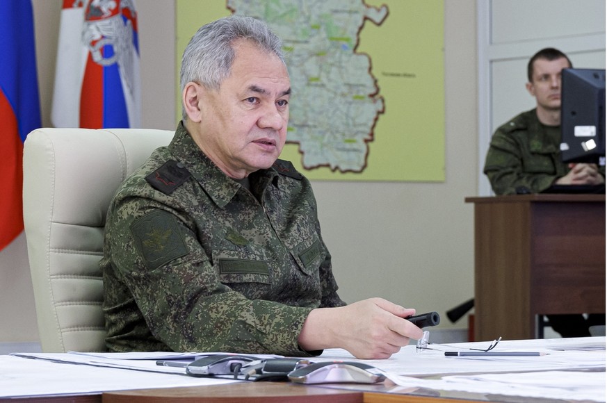 In this handout photo released by Russian Defense Ministry Press Service on Tuesday, Jan. 17, 2023, Russian Defense Minister Sergei Shoigu speaks as he inspects Russian troops at an undisclosed locati ...