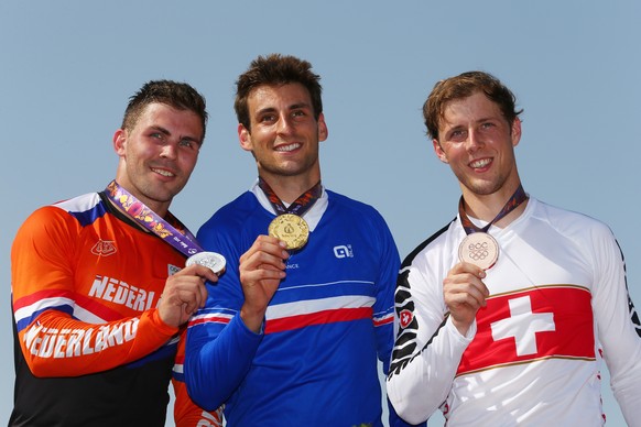 BAKU, AZERBAIJAN - JUNE 28: (L-R) Silver medalist Twan van Gendt of the Netherlands, gold medalist Joris Daudet of France and David Graf of Switzerland pose on the medal podium following the Men&#039; ...