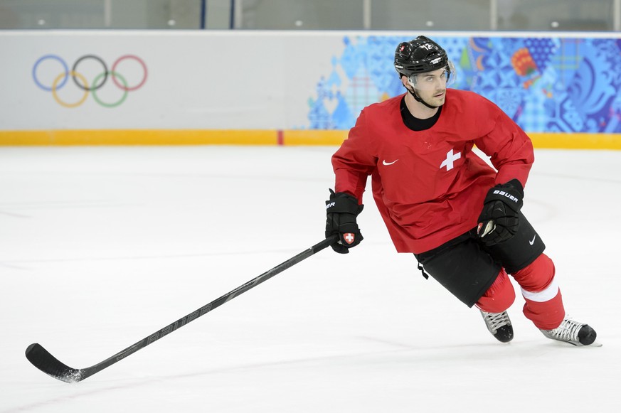 Switzerland&#039;s forward Luca Cunti plays during a training session of the Swiss men&#039;s national ice hockey team at the XXII Winter Olympics 2014 Sochi in Sochi, Russia, on Monday, February 10,  ...