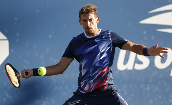 epa07803183 Henri Laaksonen of Switzerland hits a return to Denis Shapovalov of Canada during their match on the fourth day of the US Open Tennis Championships the USTA National Tennis Center in Flush ...