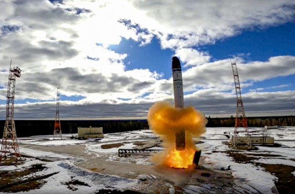 epa09899715 A handout still image taken from handout video made available by the Russian Defence ministry press-service shows launch of the Russian new intercontinental ballistic missile &#039;Sarmat& ...