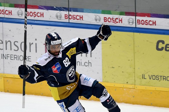 Ambri&#039;s player Michael Ngoy celebrates the 1 - 0 goal, during the preliminary round game of National League Swiss Championship 2018/19 between HC Ambri Piotta and EV Zug, at the ice stadium Valas ...