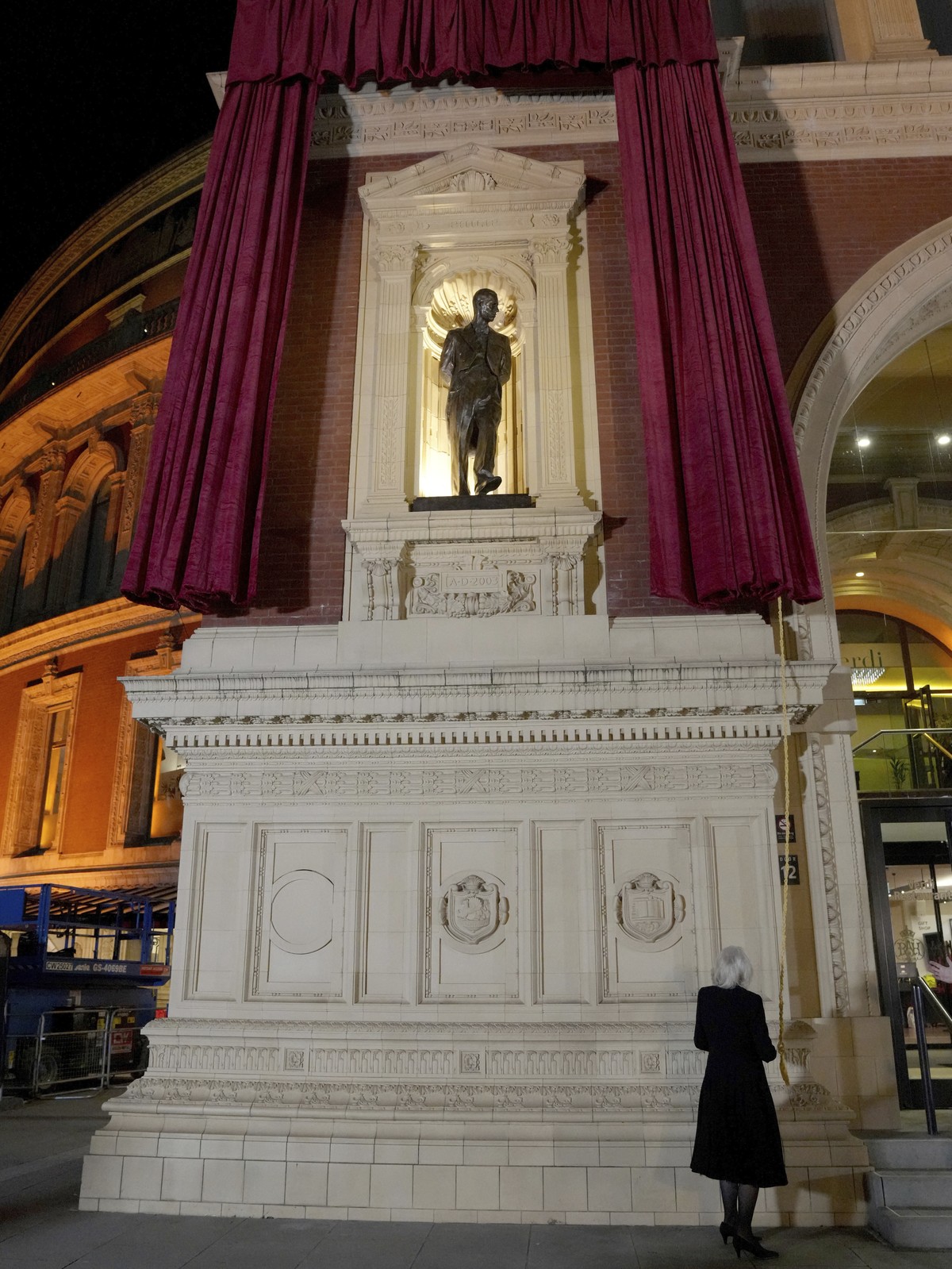 Britain's Queen Camilla unveils a statue of Britain's Prince Philip as she arrives to attend The Royal British Legion Festival of Remembrance at Royal Albert Hall, London, Saturday Nov. 11,  ...