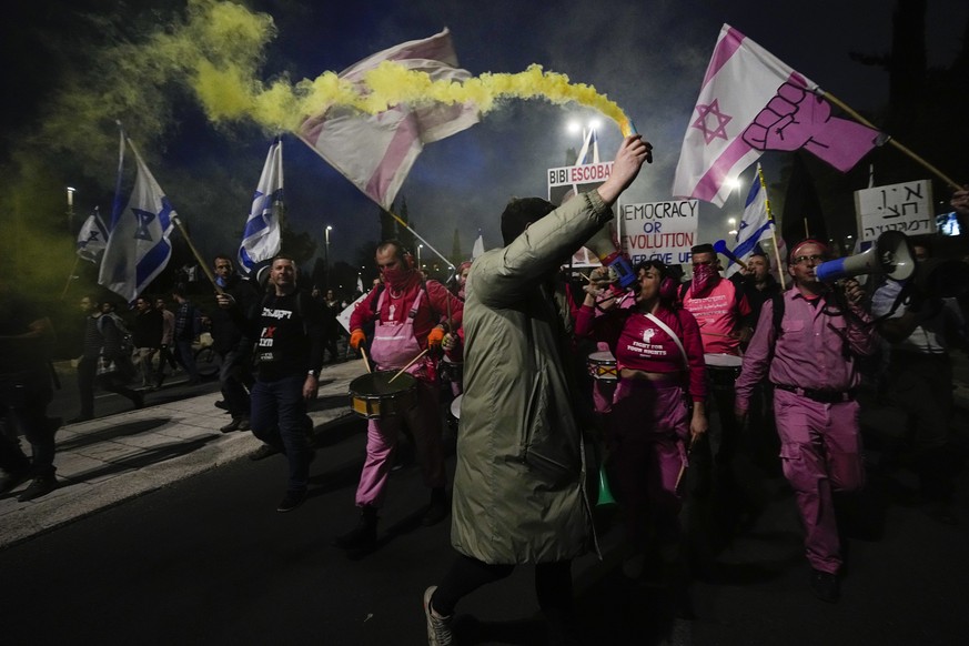 Israelis protest against plans by Prime Minister Benjamin Netanyahu&#039;s new government to overhaul the judicial system, near the Knesset, Israel&#039;s parliament in Jerusalem, Monday, Feb. 20, 202 ...