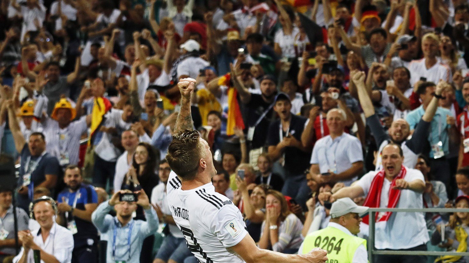 epaselect epa06834806 Toni Kroos of Germany celebrates after scoring the winning goal during the FIFA World Cup 2018 group F preliminary round soccer match between Germany and Sweden in Sochi, Russia, ...