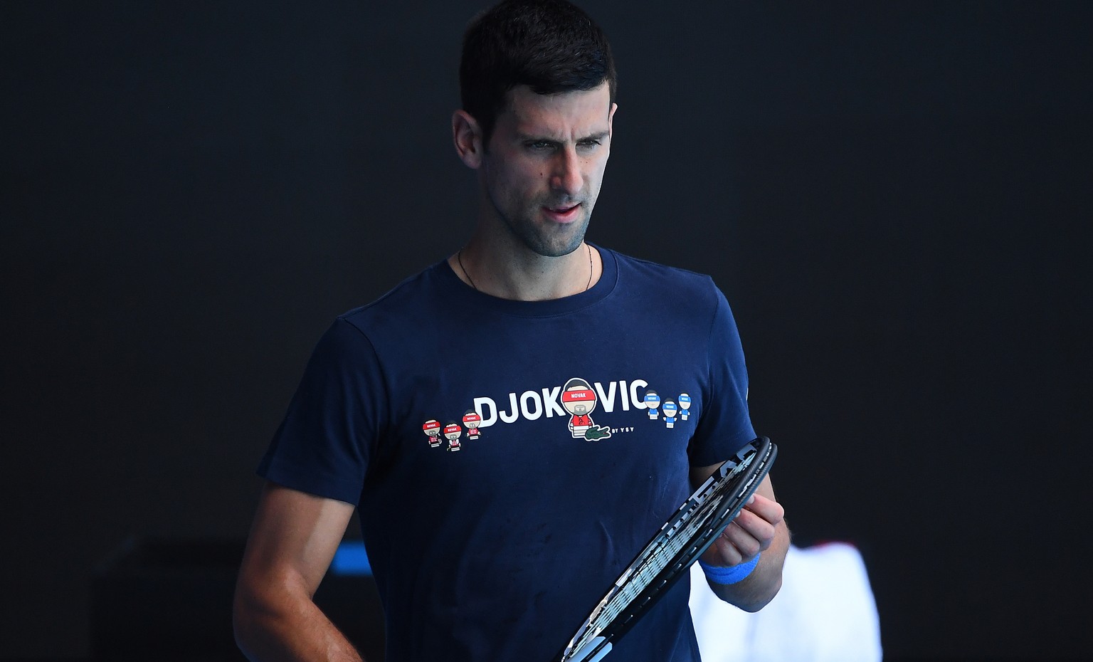 epa09679652 Novak Djokovic of Serbia is seen during a training session at Melbourne Park in Melbourne, Australia, 12 January 2022. EPA/JAMES ROSS AUSTRALIA AND NEW ZEALAND OUT