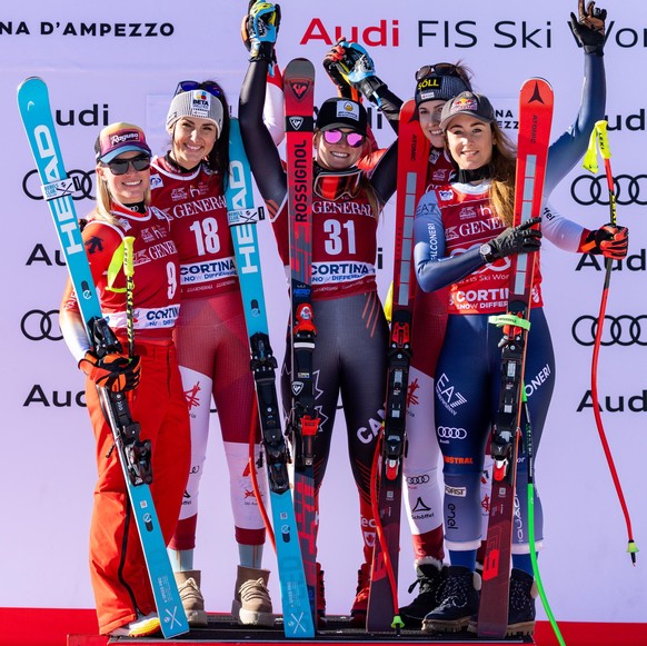 epa11106168 Second placed Lara Gut-Behrami of Switzerland, winner Stephanie Venier of Austria and third placed ex-aequo Valerie Grenier of Canada, Christina Ager of Austria and Sofia Goggia of Italy c ...