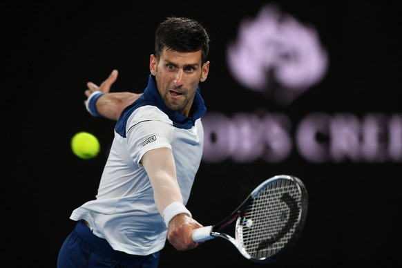 epa06464152 Novak Djokovic of Serbia in action dudirng his fourth round match against Hyeon Chung of of South Korea at the Australian Open tennis tournament, in Melbourne, Victoria, Australia, 22 Janu ...