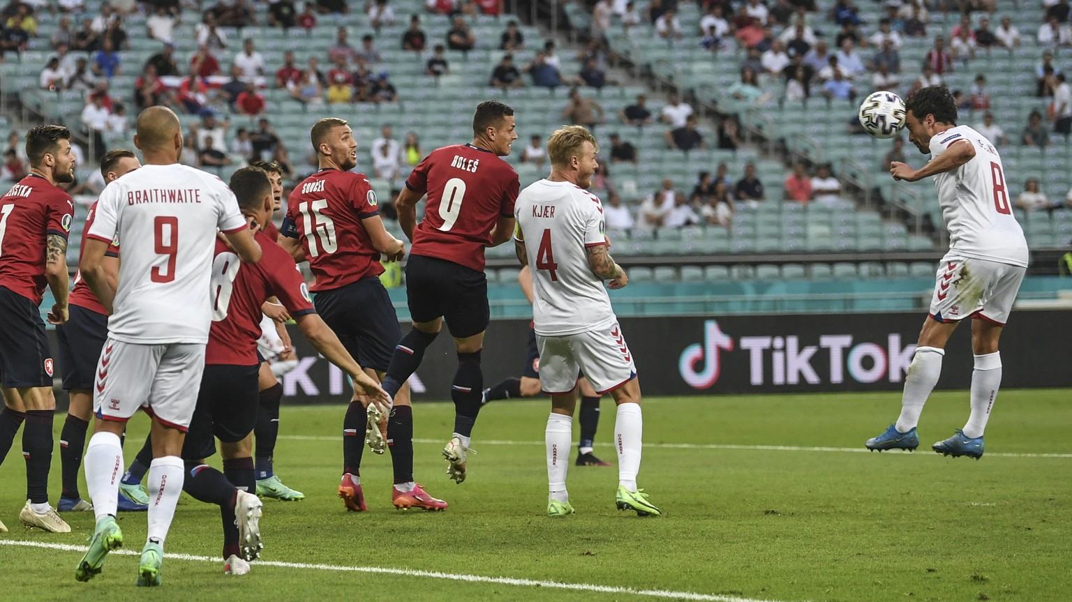 Denmark&#039;s Thomas Delaney, right, scores his side&#039;s opening goal during the Euro 2020 soccer championship quarterfinal match between Czech Republic and Denmark, at the Olympic stadium in Baku ...