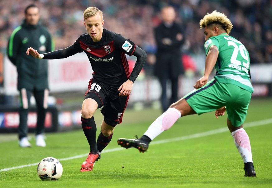 epa05658064 Bremen&#039;s Serge Gnabry (R) in action against Ingolstadt&#039;s Florent Hadergjonaj (L) during the German Bundesliga soccer match between Werder Bremen and FC Ingolstadt 04 at Weser sta ...