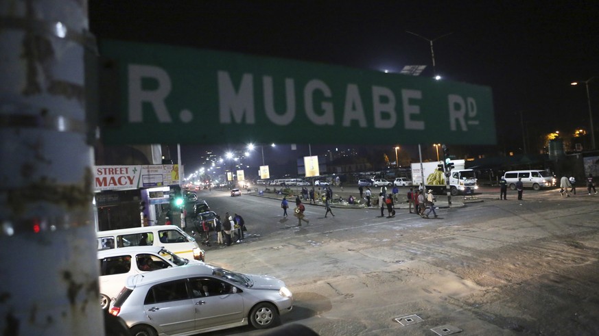 A street scene along Robert Mugabe road in Harare, Tuesday, Nov. 14, 2017. The Associated Press saw three armored personnel carriers with several soldiers in a convoy on a road heading toward an army  ...